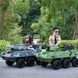Электромобиль танк двухместный 4 мотора 35W аккумулятор 12V7AH серый (M 4862BR-11)